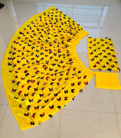 Yellow georgette butterfly embelished crop top lehenga