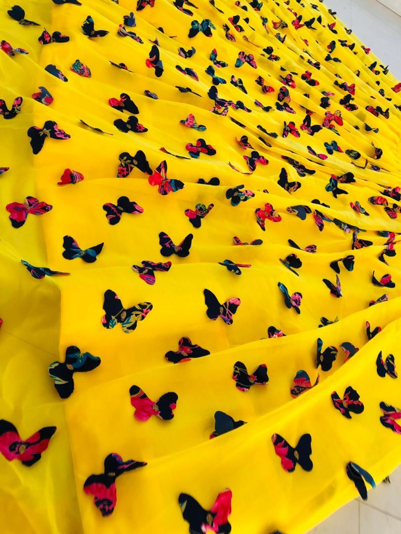 Yellow georgette butterfly embelished crop top lehenga