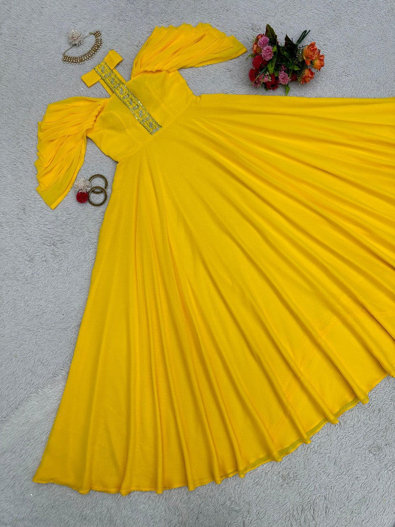 Yellow georgette designer gown for ceremony
