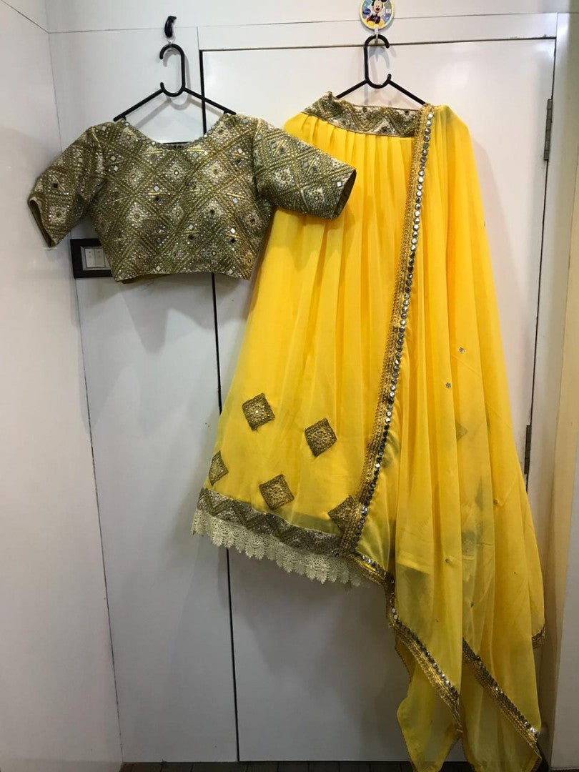 yellow georgette designer mirror work lehenga with heavy blouse