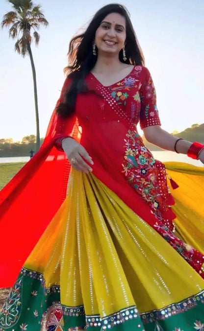 Yellow georgette embroidered and real mirror work festival lehenga choli