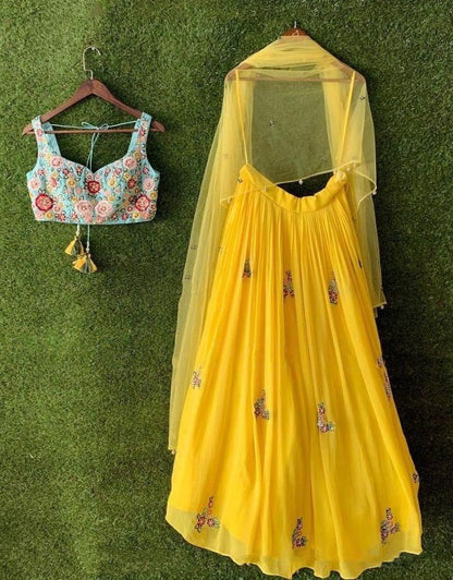 Yellow georgette embroidered lehenga choli for haldi ceremony