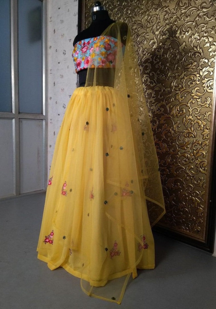 Yellow georgette embroidered lehenga choli for haldi ceremony