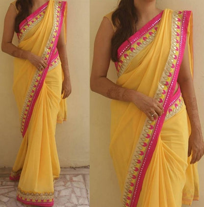 Yellow georgette embroidered partywear saree
