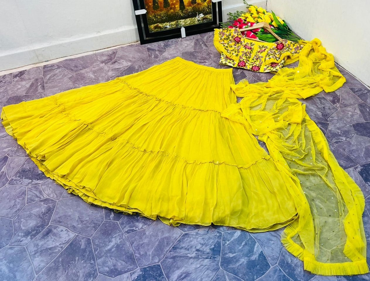Yellow georgette embroidered ruffle lehenga for haldi ceremony