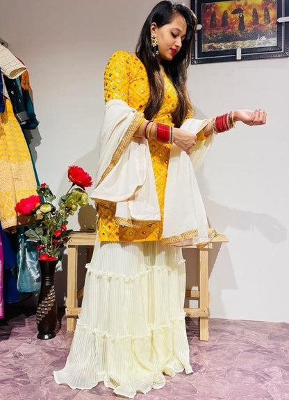 Yellow georgette embroidered sharara salwar suit
