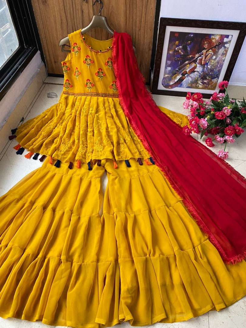 Yellow georgette embroidered sharara salwar suit