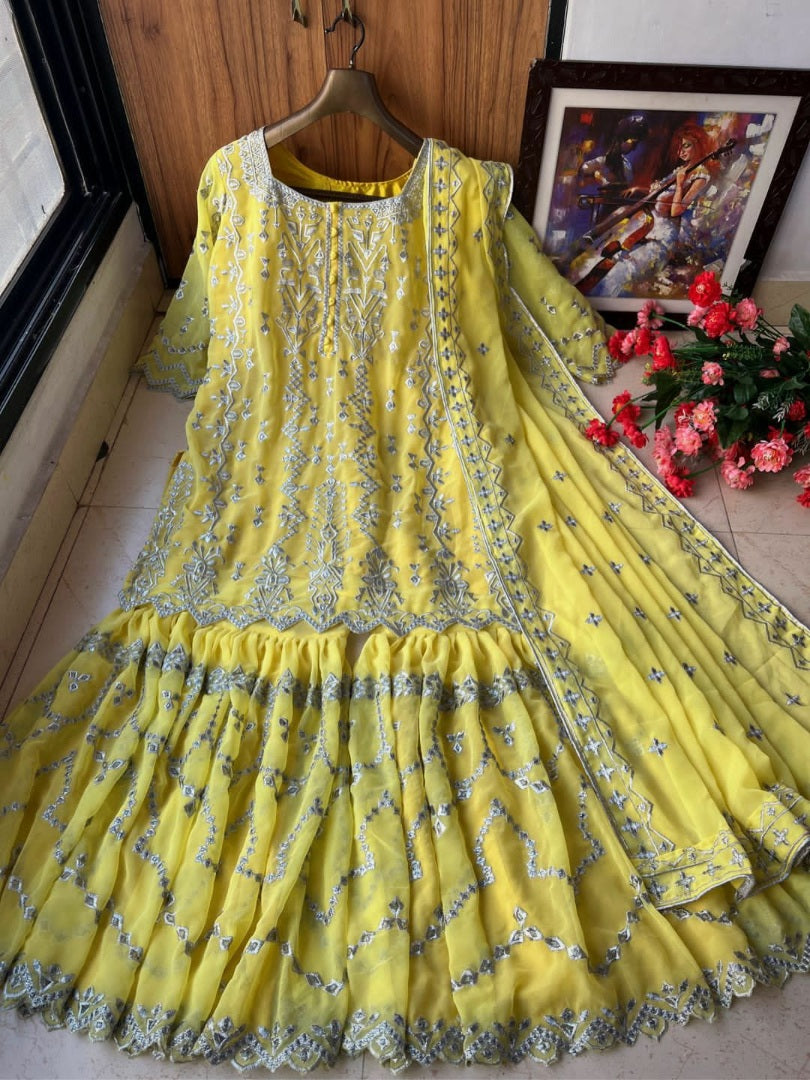 Yellow georgette embroidered sharara salwar suit