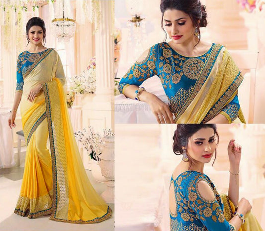 Yellow georgette embroidered wedding saree with heavy blouse