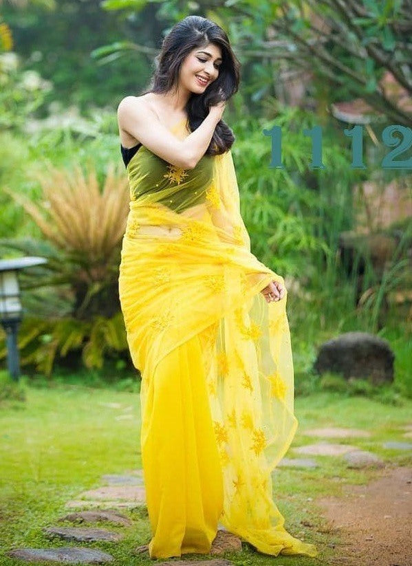 Yellow georgette embroidery and moti work saree