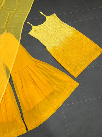 Yellow georgette embroidery work sharara suit for haldi ceremony