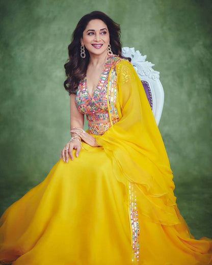 Yellow georgette fancy thread paper mirror work lehenga choli
