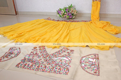 Yellow georgette fancy thread paper mirror work lehenga choli