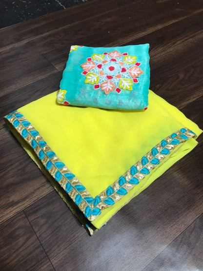 yellow georgette festival wear saree with embroidered blouse
