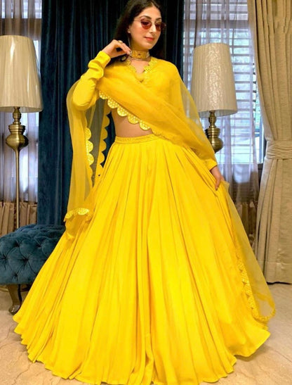 Yellow georgette foil mirror work ceremonial lehenga choli