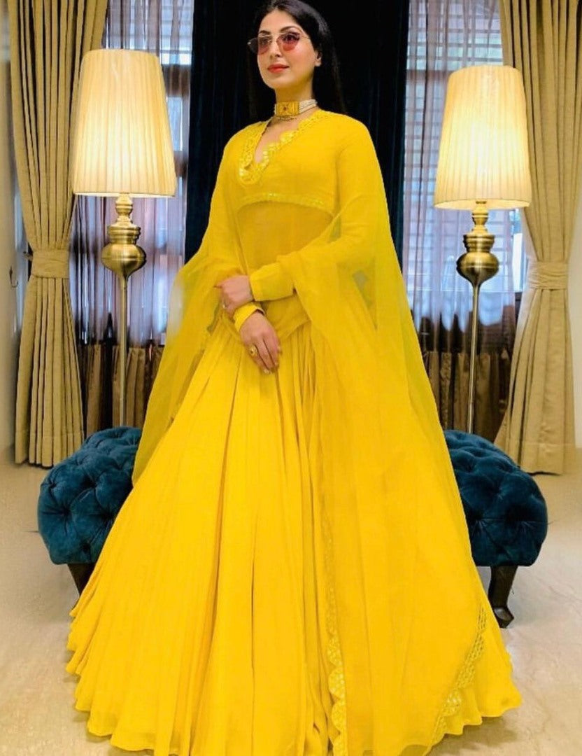 Yellow georgette foil mirror work ceremonial lehenga choli