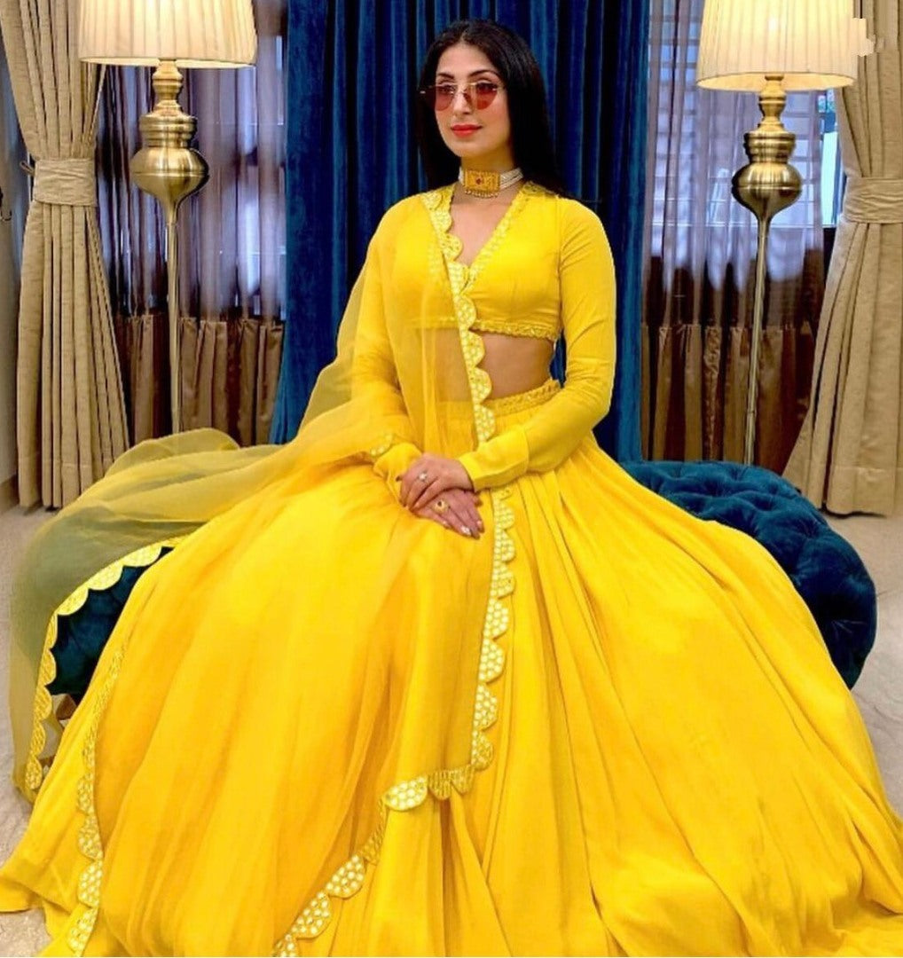 Yellow georgette foil mirror work ceremonial lehenga choli