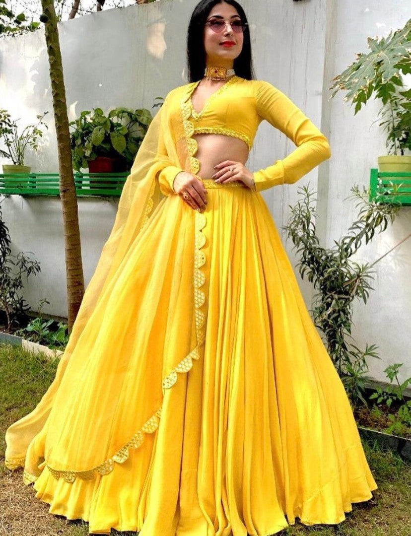 Yellow georgette foil mirror work ceremonial lehenga choli