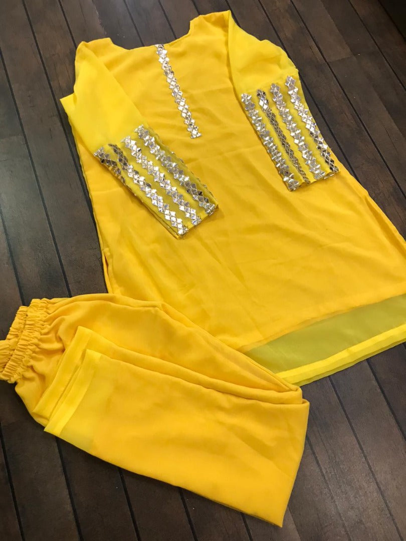 Yellow georgette foil mirror work kurti