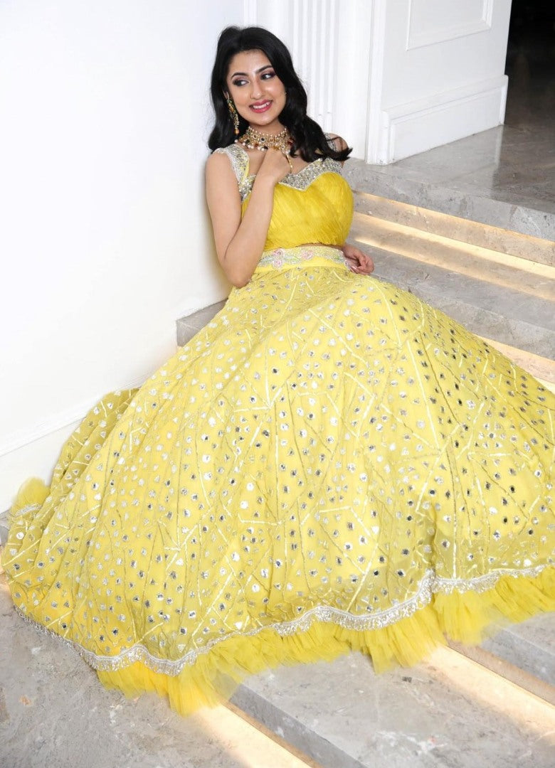 Yellow georgette heavy embroidered foil paper work lehenga choli for haldi ceremony