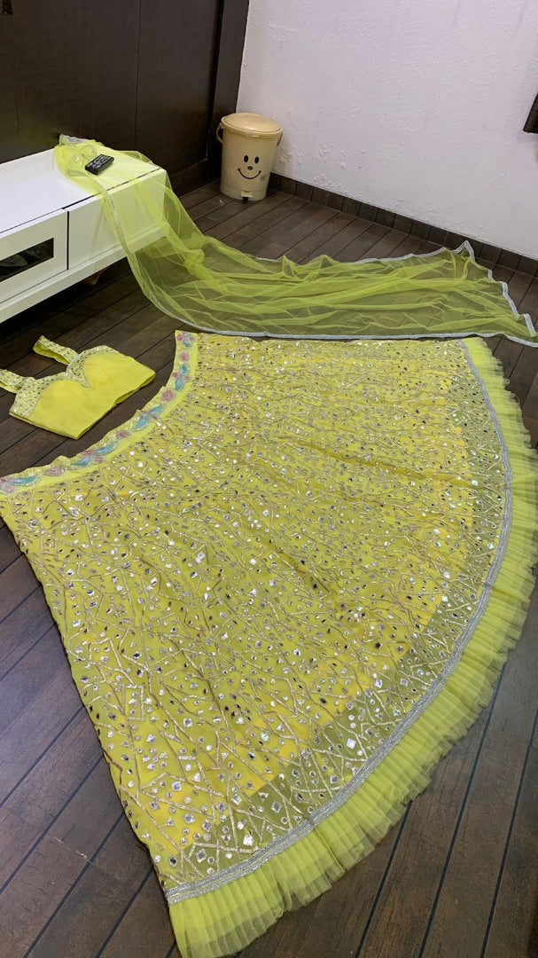 Yellow georgette heavy embroidered foil paper work lehenga choli for haldi ceremony