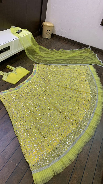 Yellow georgette heavy embroidered foil paper work lehenga choli for haldi ceremony