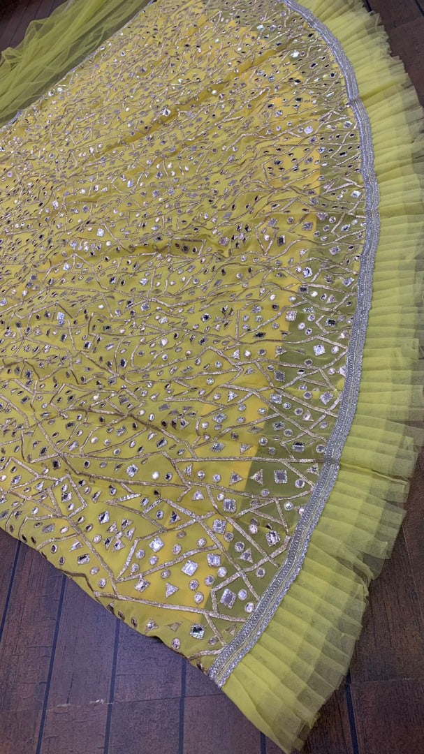 Yellow georgette heavy embroidered foil paper work lehenga choli for haldi ceremony