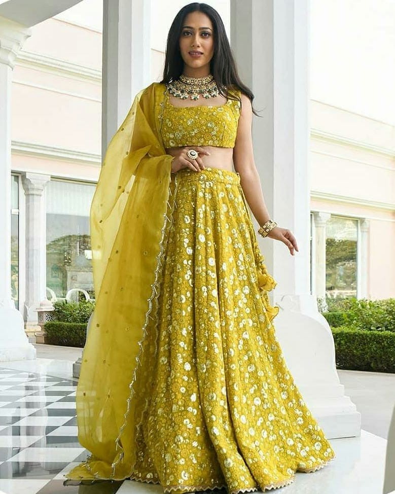 Yellow georgette heavy embroidered lehenga choli for haldi ceremony