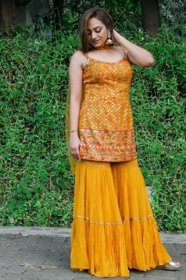 Yellow georgette heavy embroidered sharara salwar suit