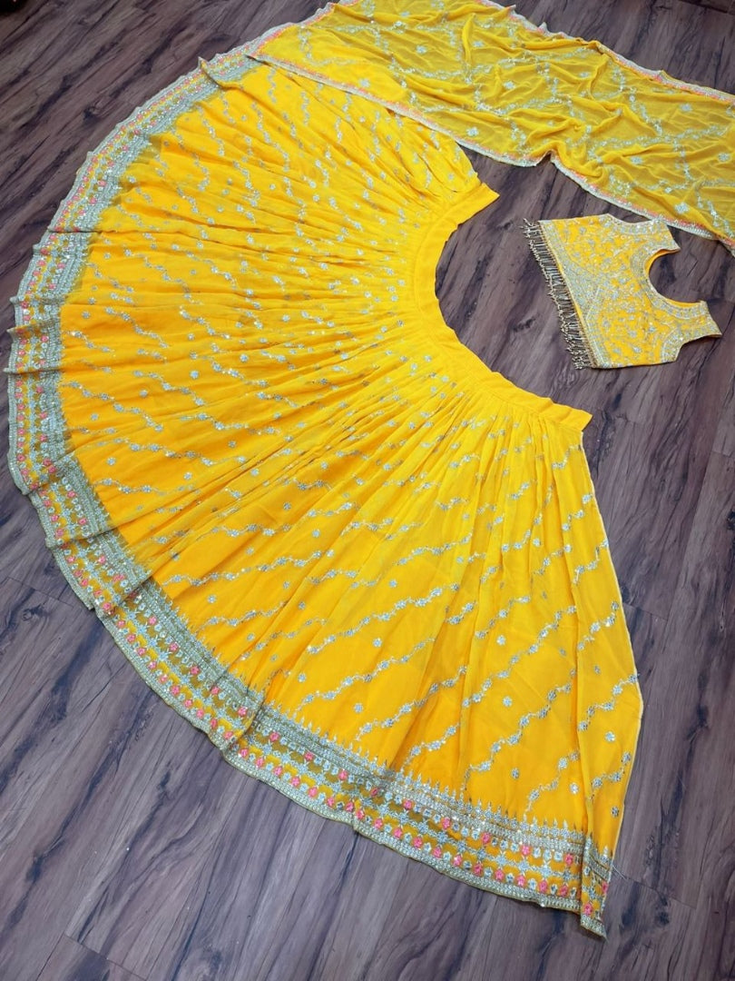 Yellow georgette heavy embroidered wedding lehenga choli
