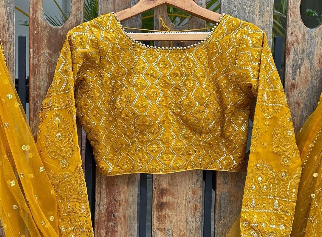 Yellow georgette heavy embroidered wedding lehenga choli