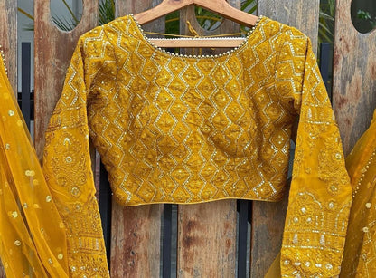 Yellow georgette heavy embroidered wedding lehenga choli