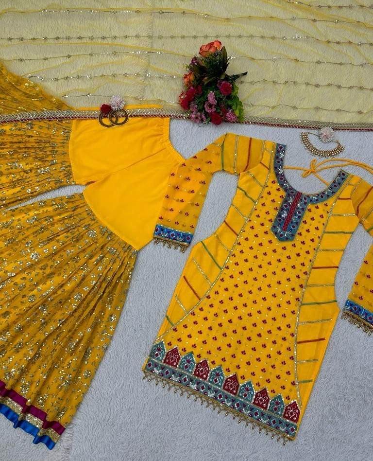 Yellow georgette heavy embroidery work sharara suit for haldi ceremony