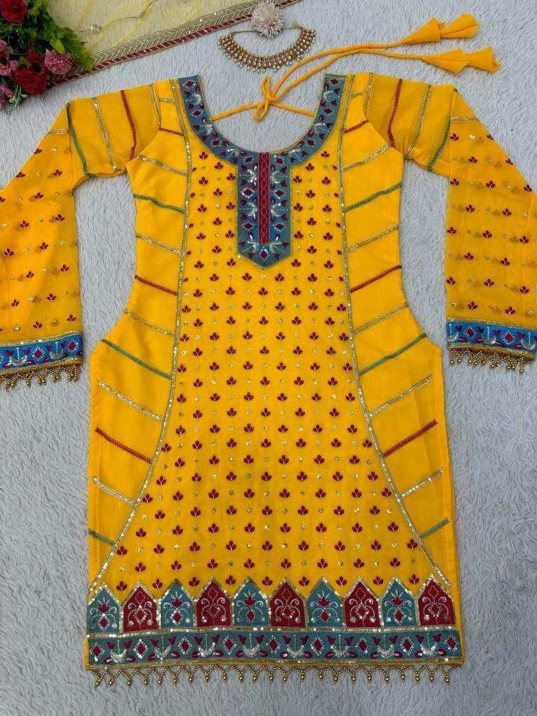 Yellow georgette heavy embroidery work sharara suit for haldi ceremony