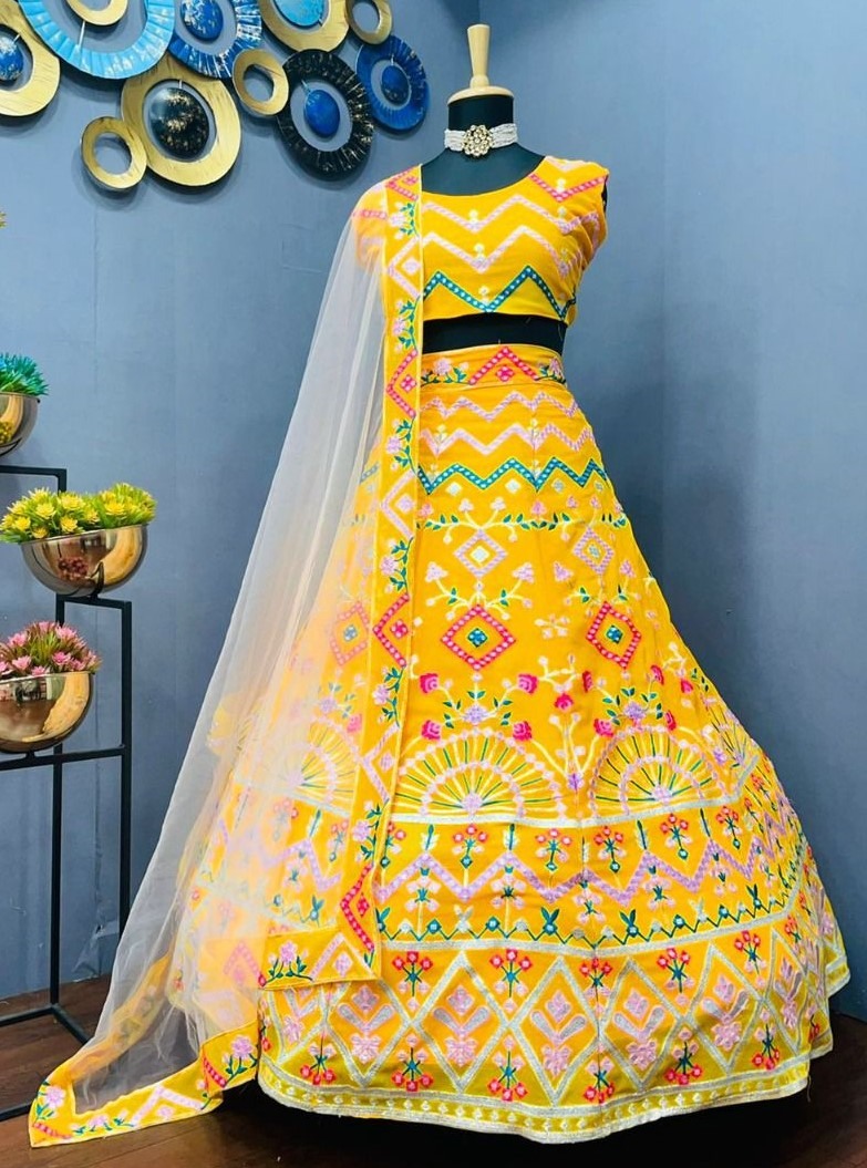 Yellow georgette heavy multi thread embroidered ceremonial lehenga choli