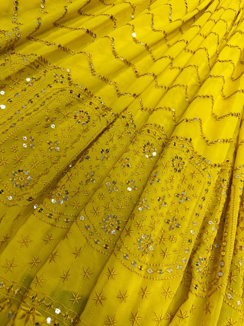Yellow georgette heavy thread sequence work lehenga for haldi ceremony
