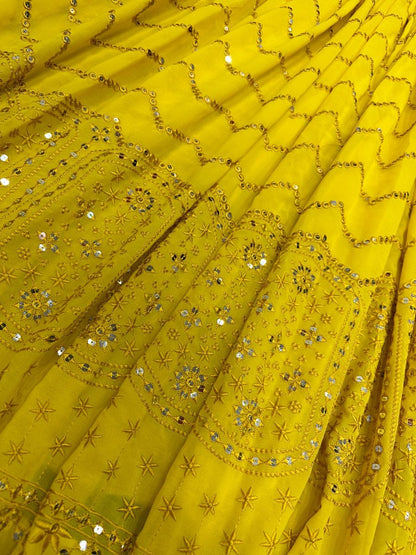 Yellow georgette heavy thread sequence work lehenga for haldi ceremony