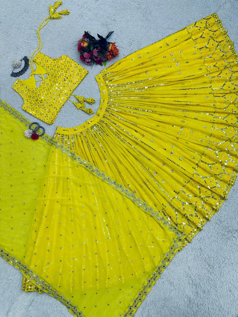 Yellow georgette heavy work lehenga choli