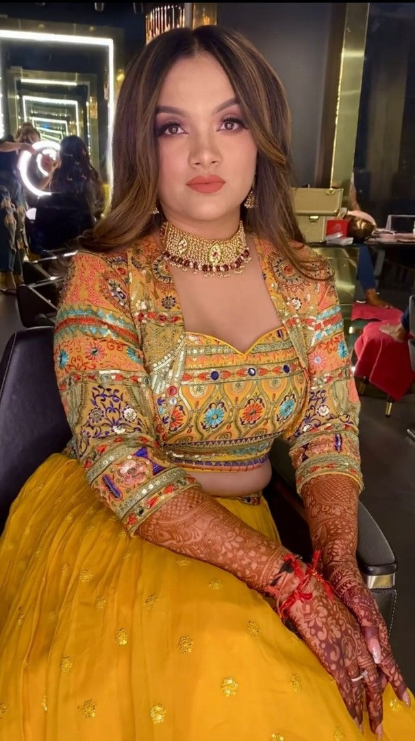 Yellow georgette multi color embroidered indowestern lehenga with jacket