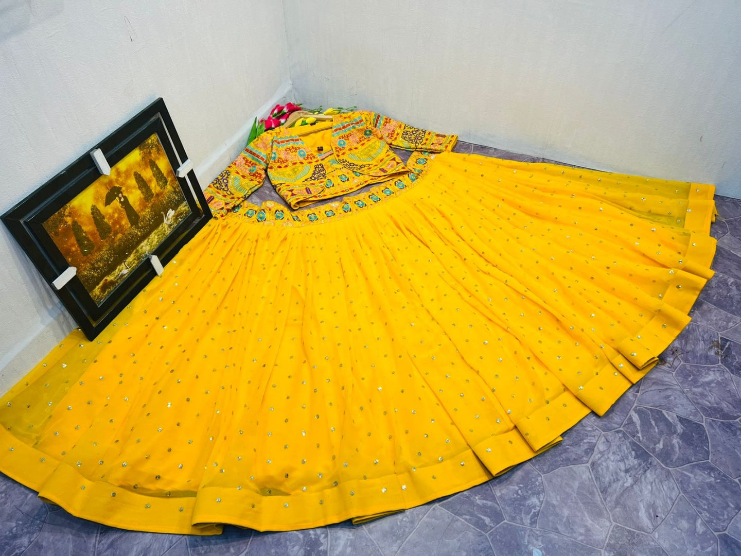 Yellow georgette multi color embroidered indowestern lehenga with jacket