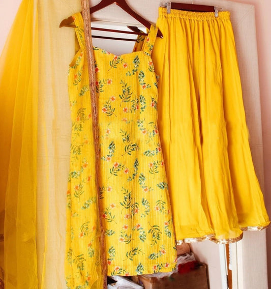 Yellow georgette print and sequence work plazzo suit