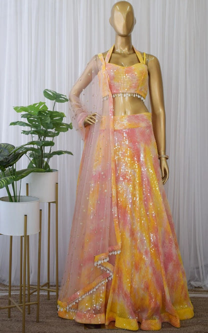 Yellow georgette printed and sequence work lehenga choli