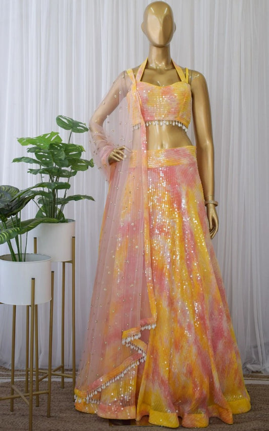 Yellow georgette printed and sequence work lehenga choli