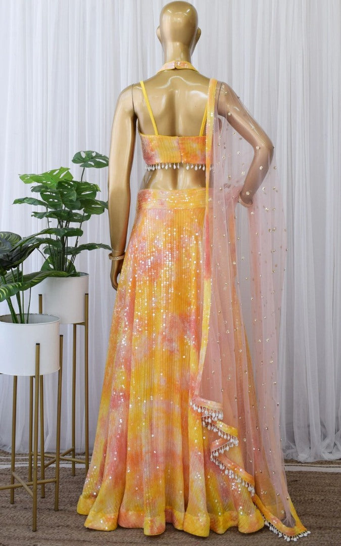 Yellow georgette printed and sequence work lehenga choli