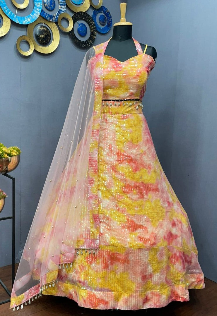 Yellow georgette printed and sequence work lehenga choli