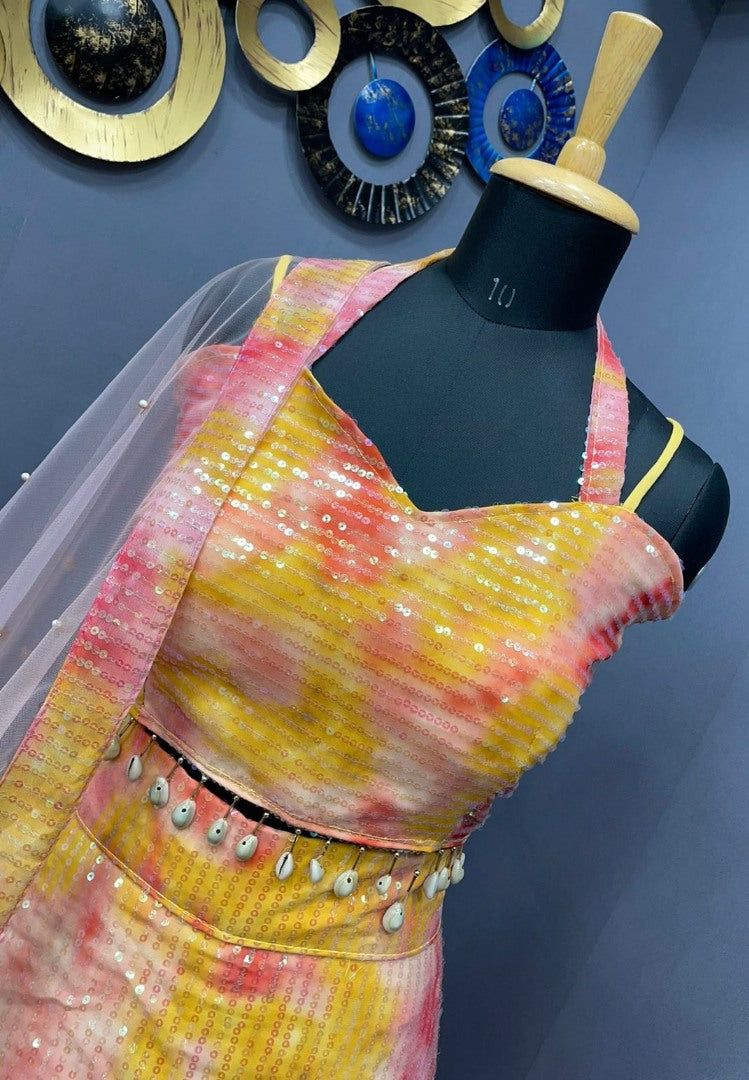 Yellow georgette printed and sequence work lehenga choli