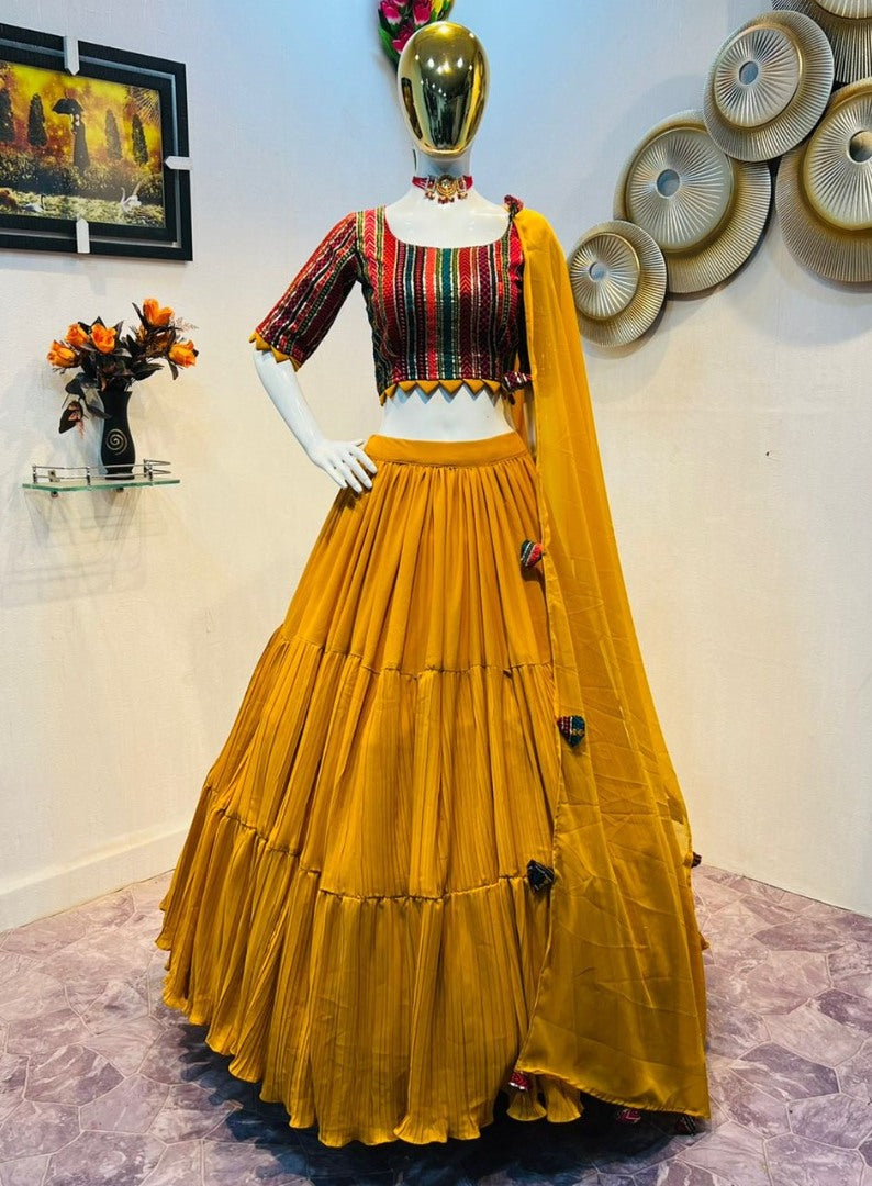 Yellow georgette ruffle layer lehenga with embroidered choli