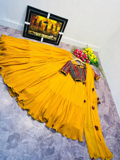 Yellow georgette ruffle layer lehenga with embroidered choli