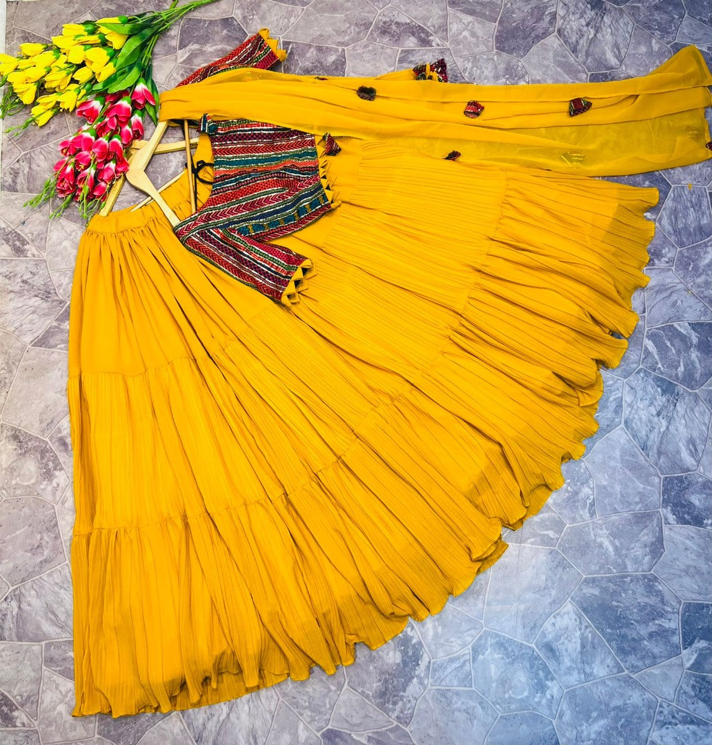 Yellow georgette ruffle layer lehenga with embroidered choli