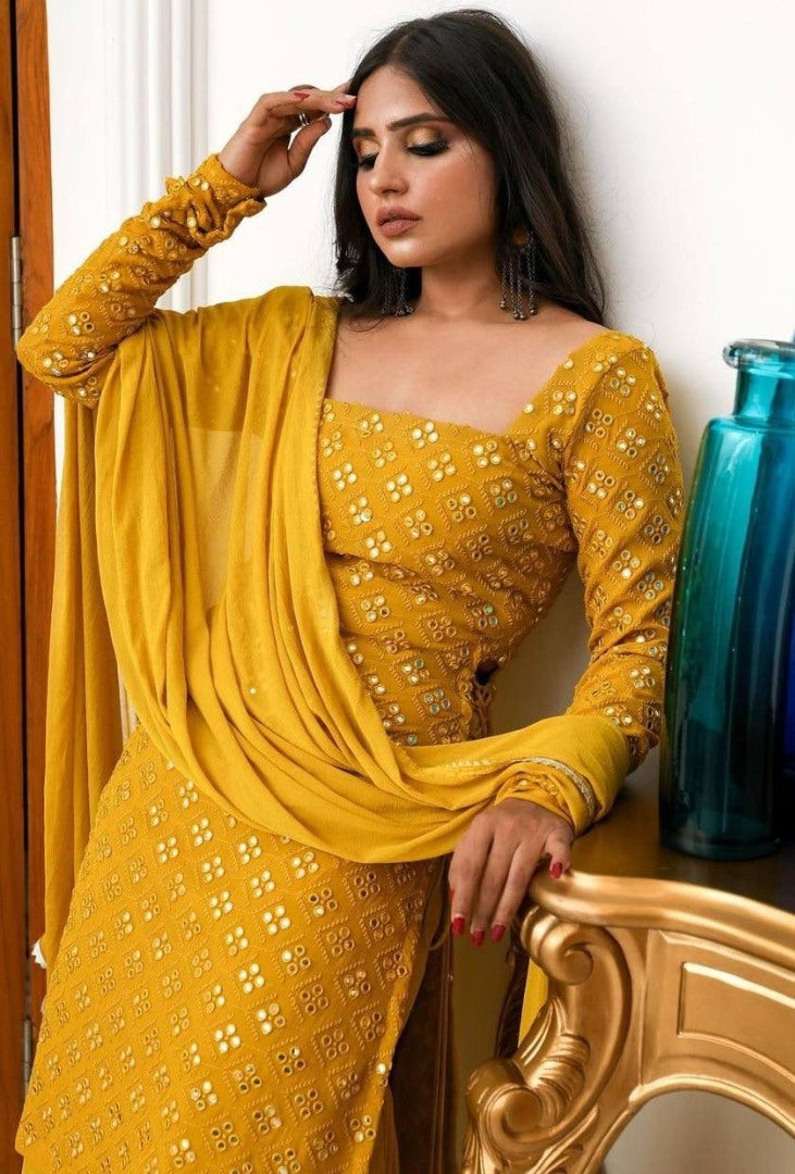 Yellow georgette thread and paper mirror work sharara suit